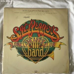 Sgt peppers lonely hearts club vinyl, Peter gram prom and The Bee Gees